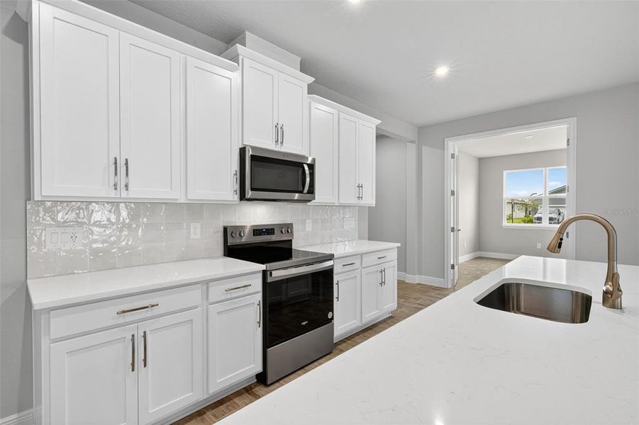 Furnished interior view inside a new home in Windwater, Parrish (Image 9).