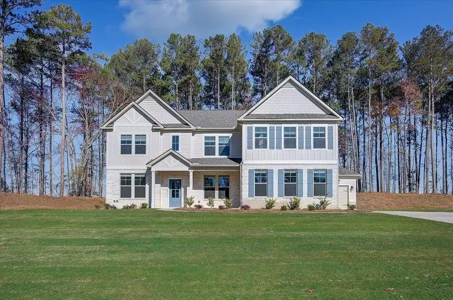 Front exterior of a new home in Riverbend Overlook, Fayetteville, GA, highlighting curb appeal (Image 2).