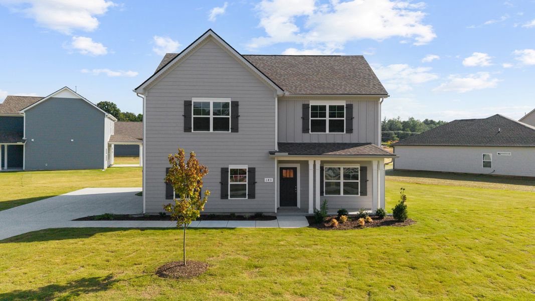 Front exterior of a new home in Stillwater, Tullahoma, TN, highlighting curb appeal (Image 21).