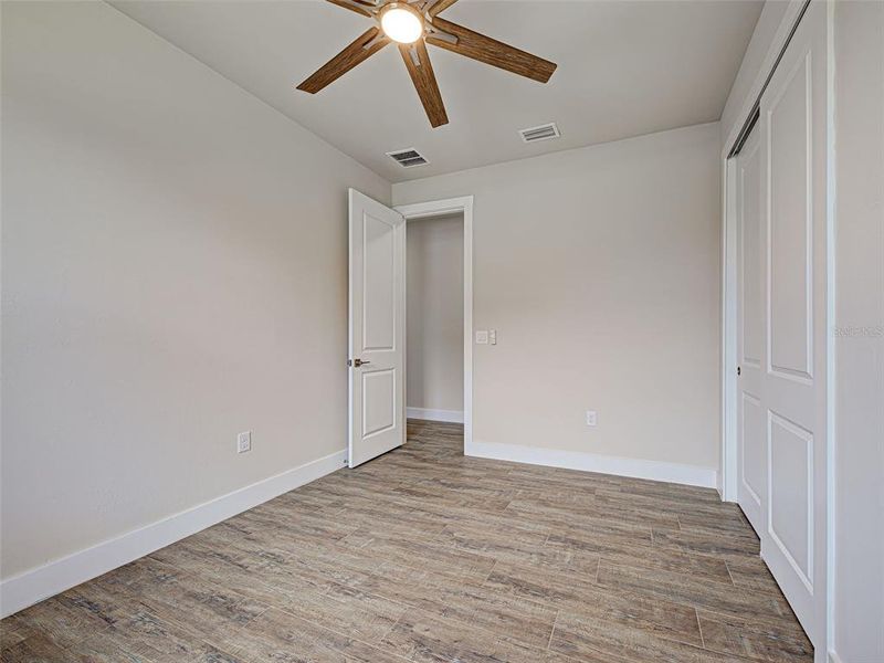 Spacious, unfurnished interior of a new home in , Port Charlotte (Image 46).