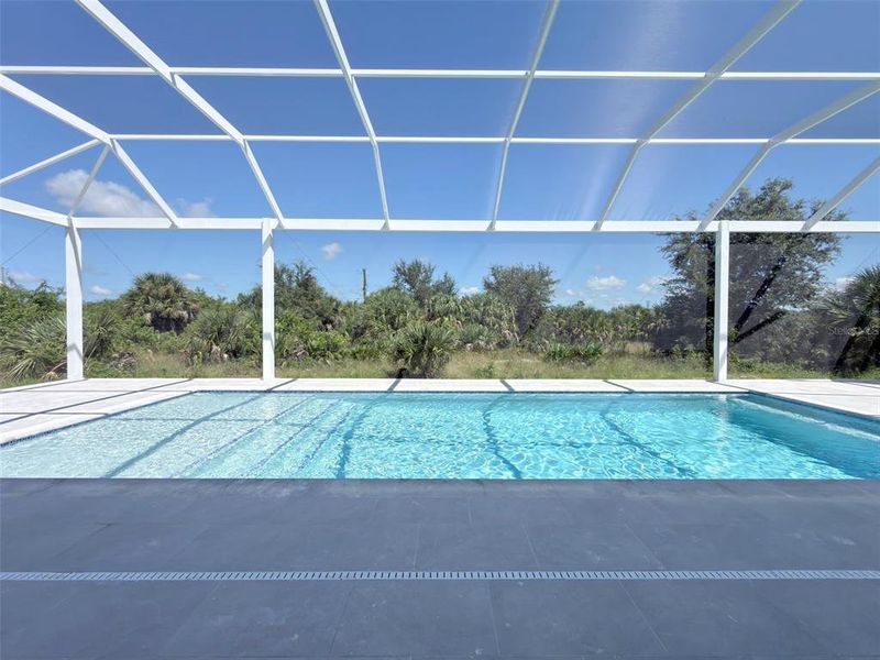 Exterior details and patio area of a home in , Port Charlotte (Image 28).