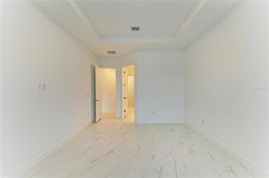 Spacious, unfurnished interior of a new home in Esplanade at Azario Lakewood Ranch, Lakewood Ranch (Image 24). Spacious, unfurnished interior of a new home in Esplanade at Azario Lakewood Ranch, Lakewood Ranch (Image 24).