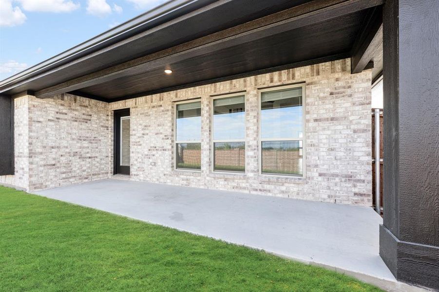 Exterior details and patio area of a home in Devonshire, Forney (Image 4).
