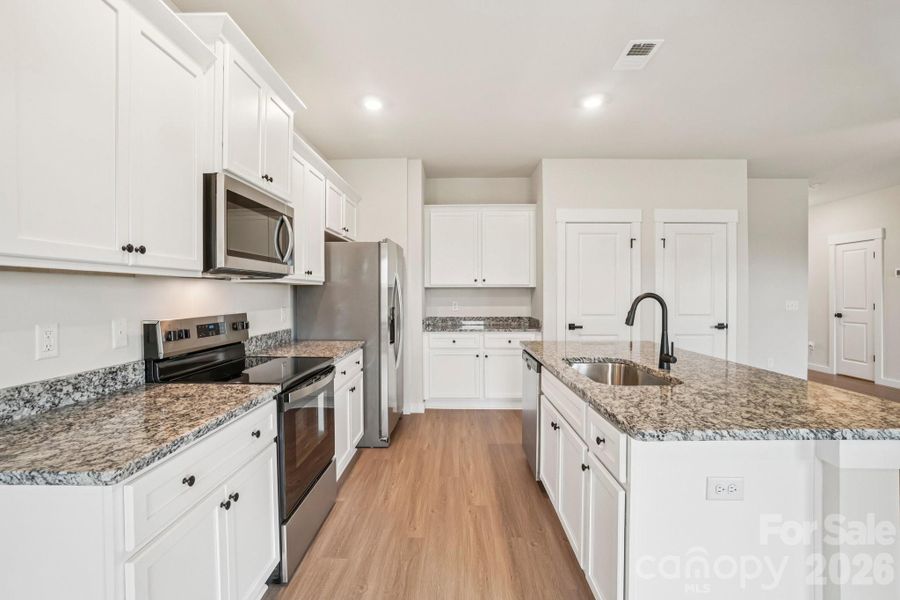 Furnished interior view inside a new home in Knights Bridge, Richburg (Image 5).