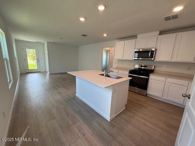 Furnished interior view inside a new home in Grand Reserve, Bunnell (Image 5).