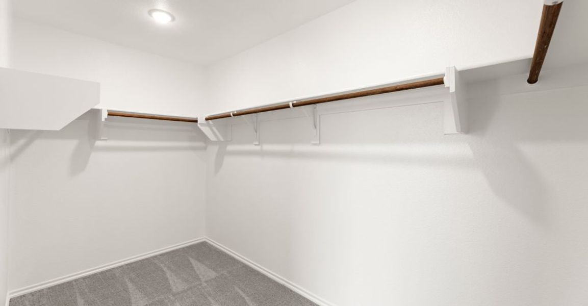 Representative exterior photo of a completed home built from the Austin by Impression Homes in Keeneland, Aubrey, TX (Image 18).