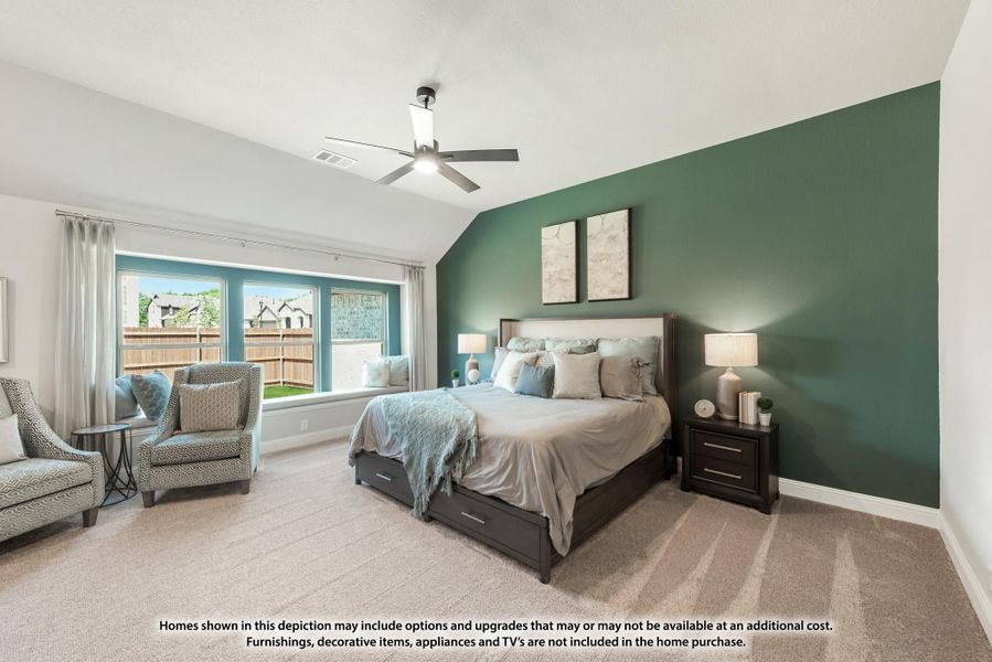 Spacious master bedroom with green accent wall, vaulted ceiling, ceiling fan, and large windows overlooking backyard. Spacious master bedroom with green accent wall, vaulted ceiling, ceiling fan, and large windows overlooking backyard.