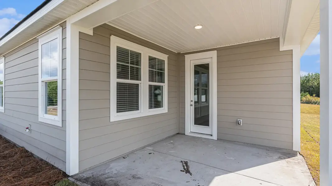 Representative exterior details of a home built from the Covington by D.R. Horton in The Highlands at Cedar Hill Landing, Navassa (Image 3).