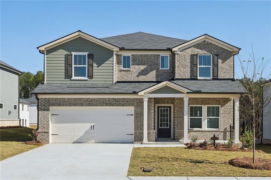 Front exterior of a new home in Parkside at Grayson, Grayson, GA, highlighting curb appeal (Image 1).