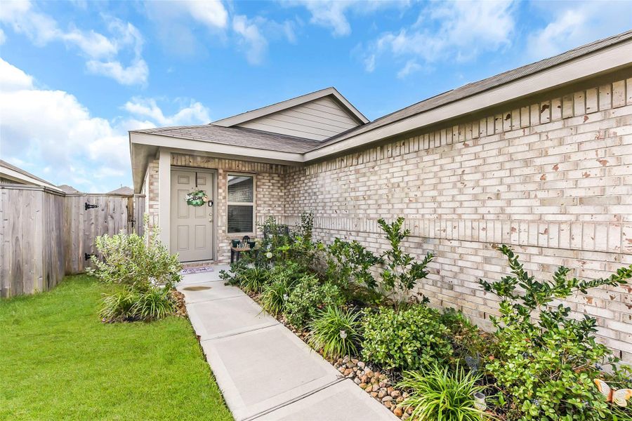 Exterior details and patio area of a home in Burnet Fields at Baytown Crossings, Baytown (Image 18).