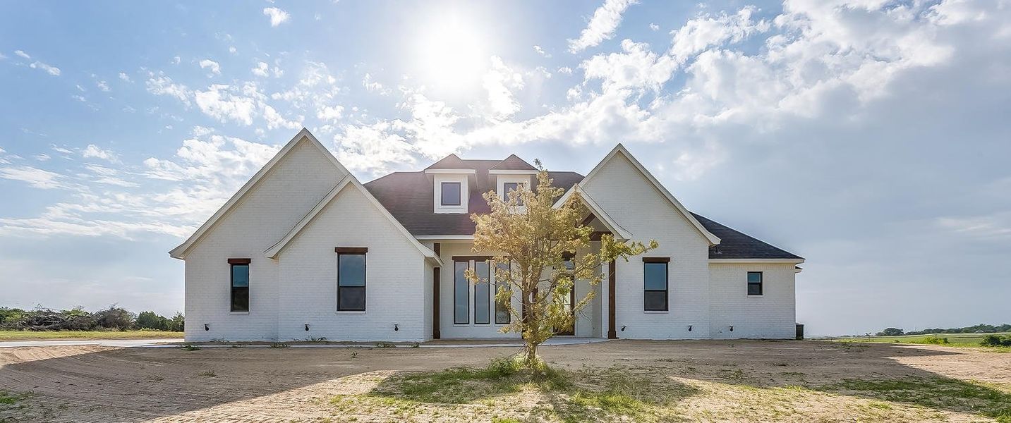 Representative exterior photo of a completed home built from the 076-2602-0518 by Abba River Homes in Stanford Estates, Springtown, TX (Image 1). Representative exterior photo of a completed home built from the 076-2602-0518 by Abba River Homes in Stanford Estates, Springtown, TX (Image 1).