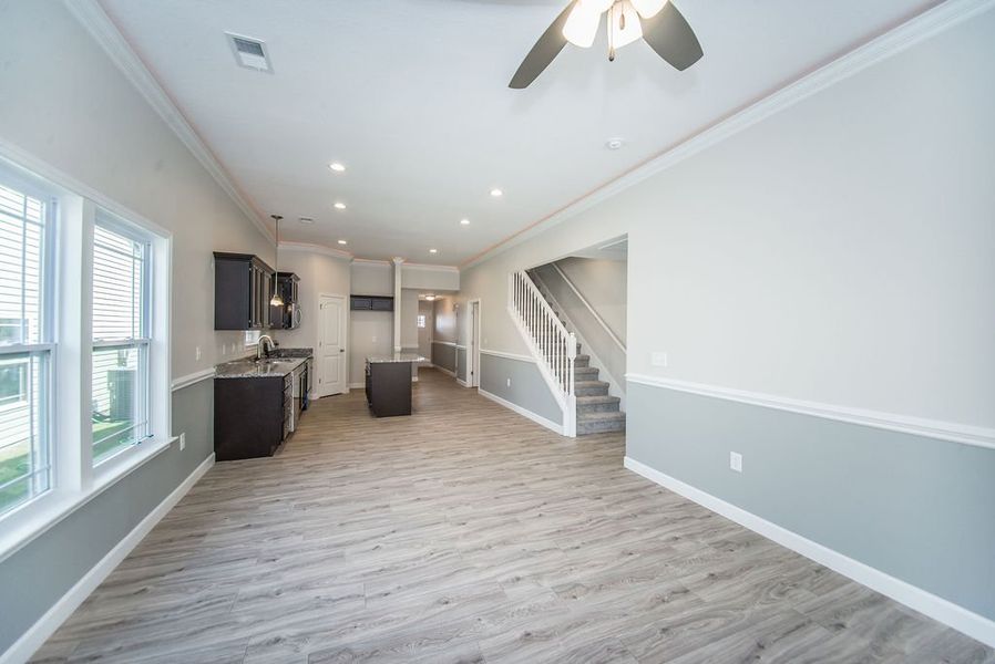 Representative unfurnished interior of a home built from the Quincy by Enchanted Homes in Lonesome Dove, San Antonio (Image 34).