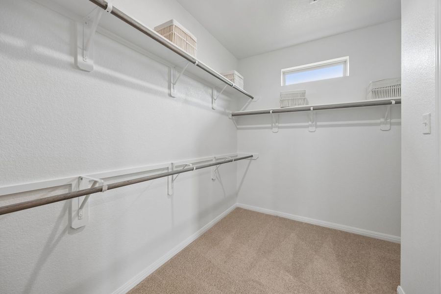 Primary Closet in the Oak home plan by Trophy Signature Homes – REPRESENTATIVE PHOTO