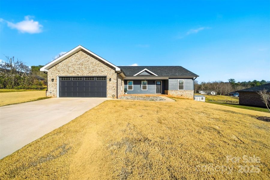 Front exterior of a new home in , Granite Falls, NC, highlighting curb appeal (Image 21).