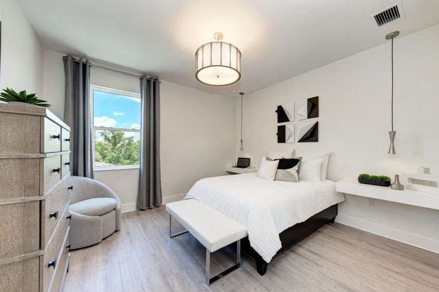 Representative furnished interior of a home built from the Pigeon Plum by Medallion Home in Aqua Single Family Homes, Bradenton (Image 9).