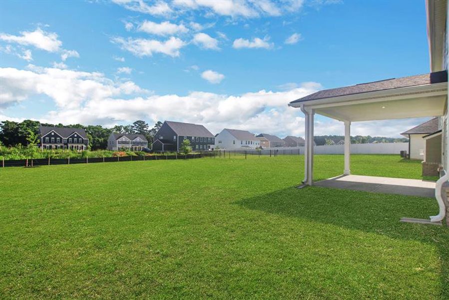 Exterior details and patio area of a home in Edinburgh, Locust Grove (Image 4).
