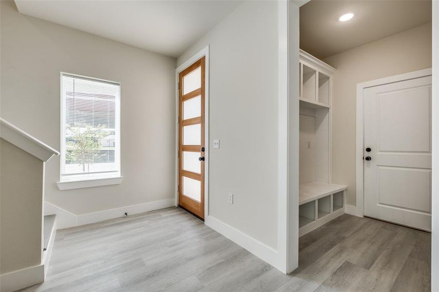 Mudroom featuring light wood-style flooring Mudroom featuring light wood-style flooring