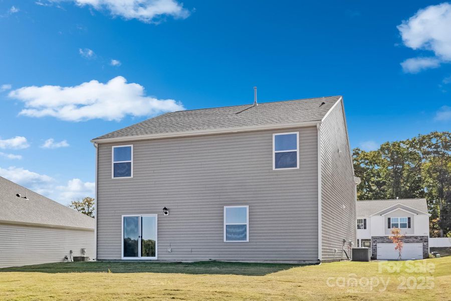 Exterior details and patio area of a home in Silverstein, Salisbury (Image 26).