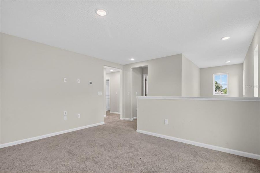 Spacious, unfurnished interior of a new home in Seasons at Forest Creek, Haines City (Image 52).