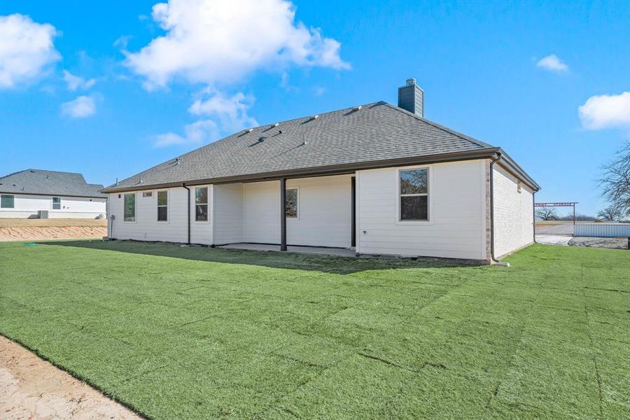 Front exterior of a new home in Saddleback Estates, Boyd, TX, highlighting curb appeal (Image 20).
