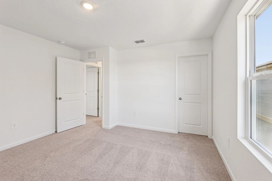 Representative unfurnished interior of a home built from the Ellis by Starlight Homes in Hawks Run, Kissimmee (Image 20).