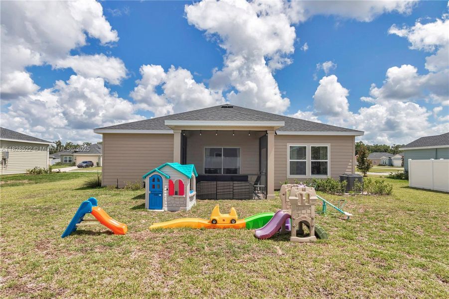 Front exterior of a new home in Country Lane Estates, Williston, FL, highlighting curb appeal (Image 23). Front exterior of a new home in Country Lane Estates, Williston, FL, highlighting curb appeal (Image 23).