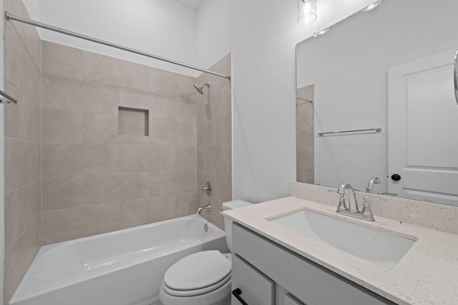 Bath 2 Downstairs with neutral design colors to match all decor. Bath 2 Downstairs with neutral design colors to match all decor.