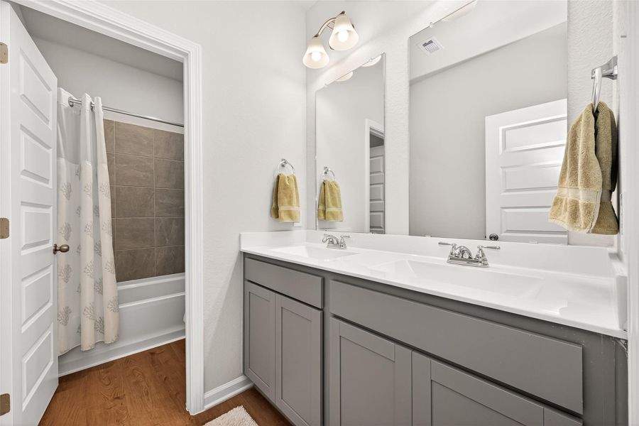 Furnished interior view inside a new home in Mill Creek Trails, Magnolia (Image 40).