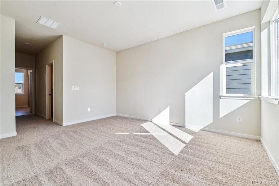 Spacious, unfurnished interior of a new home in Floret Collection at Alder Creek, Parker (Image 28).