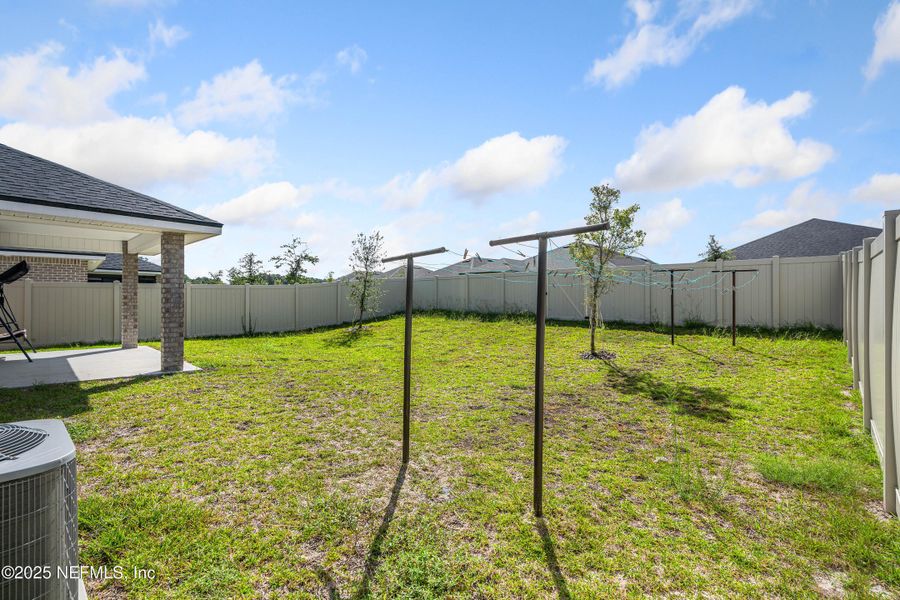 Front exterior of a new home in Shadow Crest at Rolling Hills, Green Cove Springs, FL, highlighting curb appeal (Image 17).