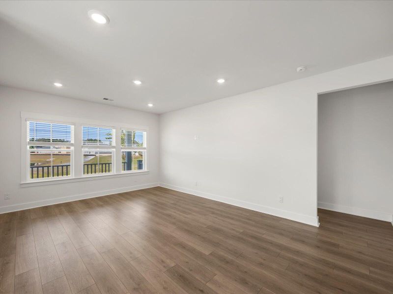 Spacious, unfurnished interior of a new home in The Coves at Lakes of Cane Bay, Summerville (Image 32). Spacious, unfurnished interior of a new home in The Coves at Lakes of Cane Bay, Summerville (Image 32).