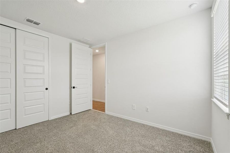 Spacious, unfurnished interior of a new home in Oakfield Trails - Signature Series, Parrish (Image 38).