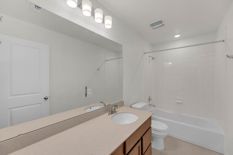 Furnished interior view inside a new home in Sonterra - Cool Water, Jarrell (Image 15).