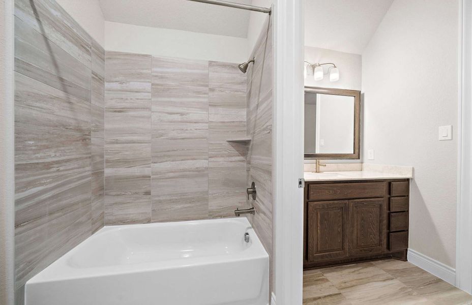 Representative furnished interior of a home built from the 4082 by Ravenna Homes in Artavia 70′, Conroe (Image 13).