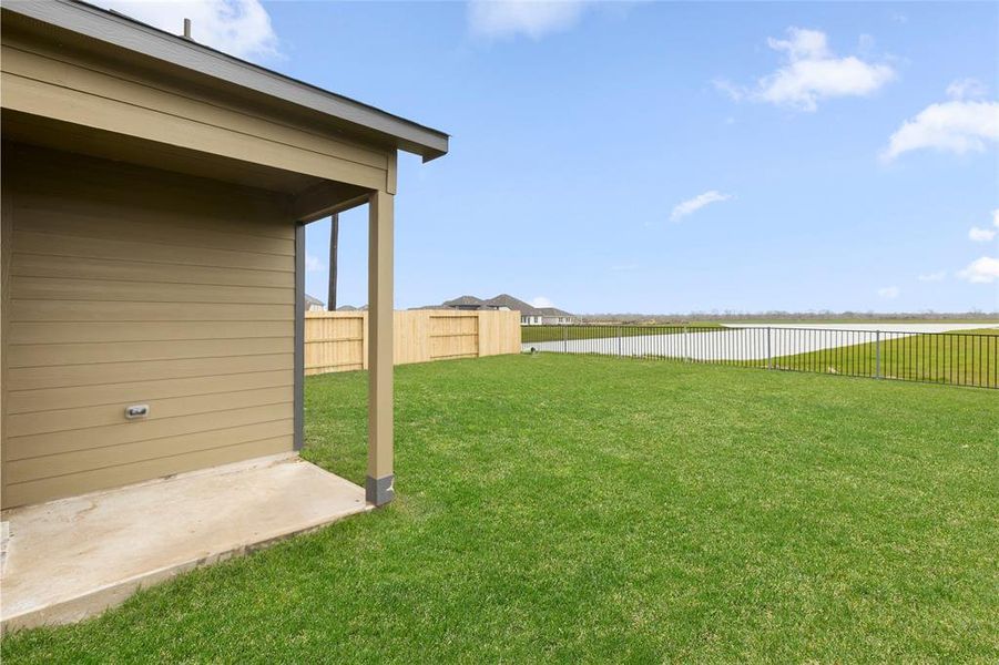 Extended backyard with lake view over 8000 sq.ft.