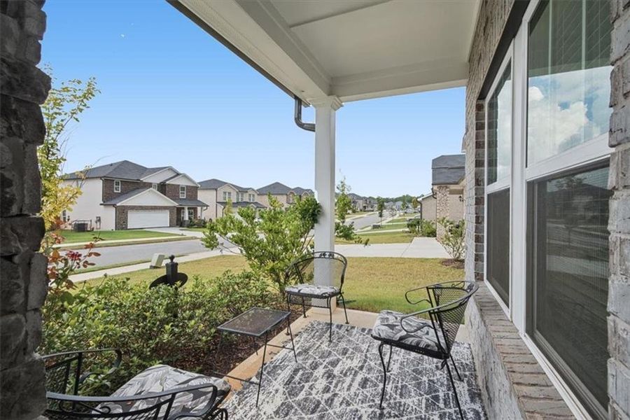 Exterior details and patio area of a home in Creekside at Oxford Park, Fairburn (Image 4).