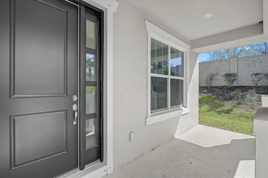Exterior details and patio area of a home in , Sarasota (Image 3).