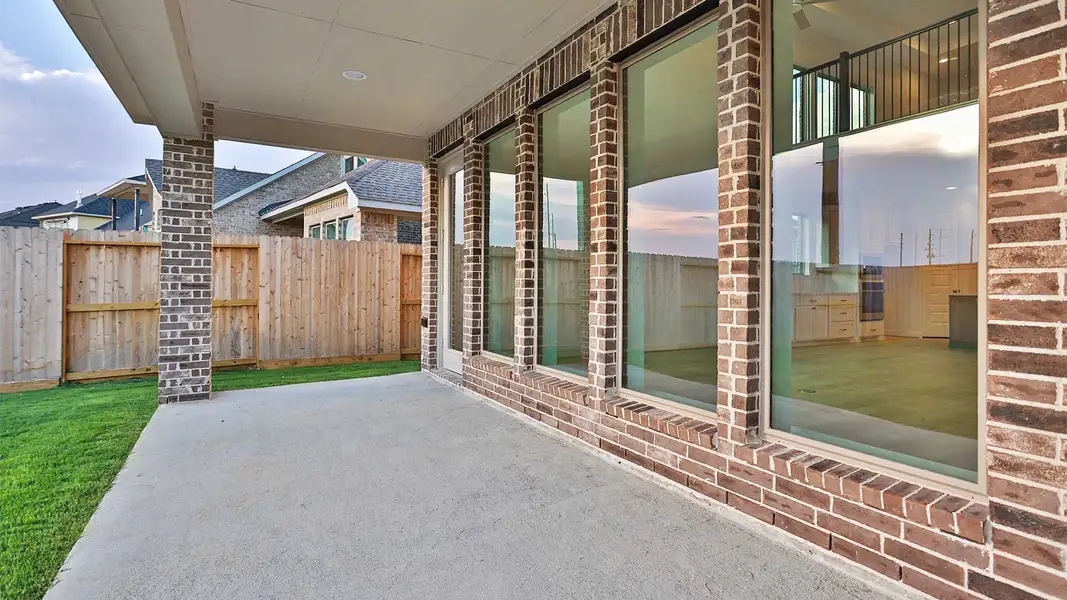 Exterior details and patio area of a home in Candela, Richmond (Image 3). Exterior details and patio area of a home in Candela, Richmond (Image 3).