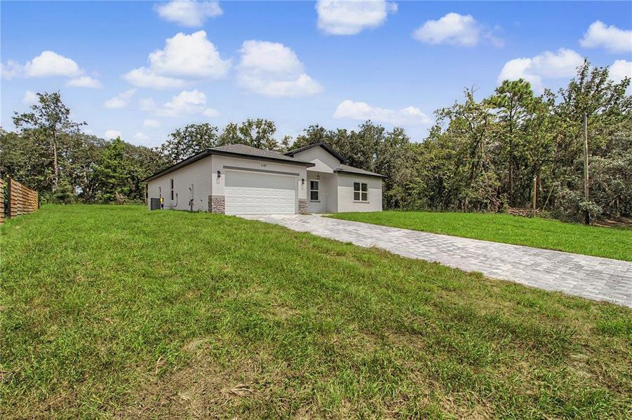 Front exterior of a new home in , Ocala, FL, highlighting curb appeal (Image 24).