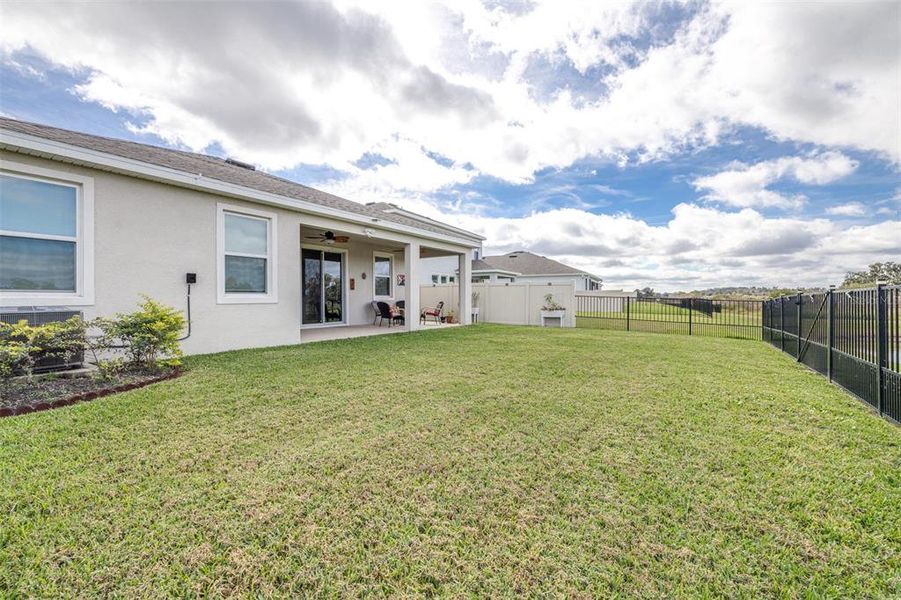 Exterior details and patio area of a home in Farm at Varrea, Plant City (Image 28).