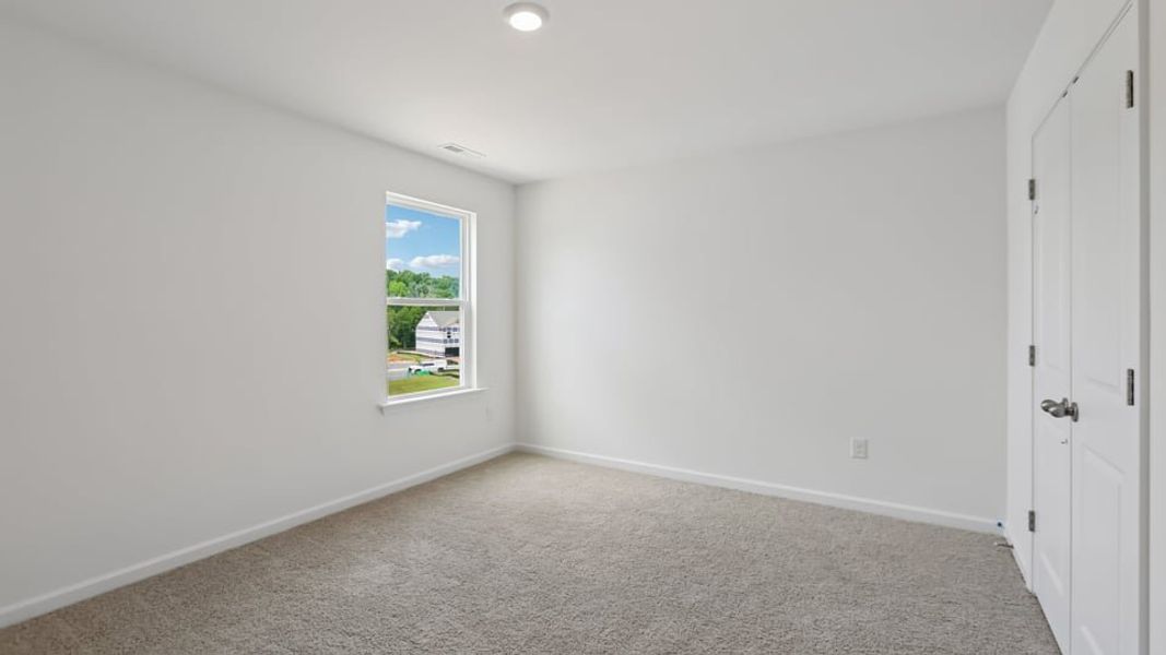 Representative unfurnished interior of a home built from the Manning by D.R. Horton in Laurel Oaks, Sanford (Image 30). Representative unfurnished interior of a home built from the Manning by D.R. Horton in Laurel Oaks, Sanford (Image 30).