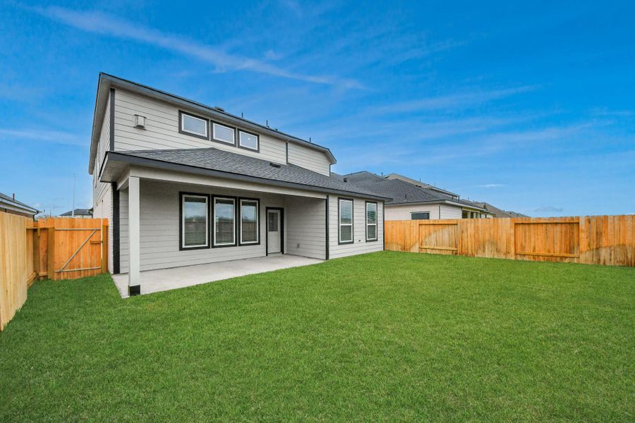 Backyard retreat, offering an abundance of space for kids to play and explore. The possibilities are endless in this outdoor haven, where the joy of open-air activities and family gatherings awaits.