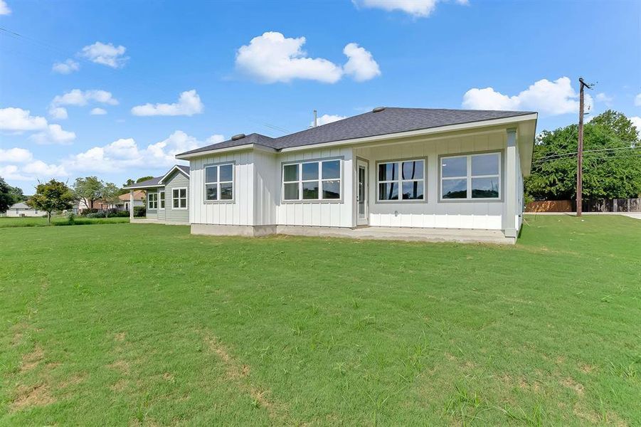 Front exterior of a new home in , Marble Falls, TX, highlighting curb appeal (Image 17).