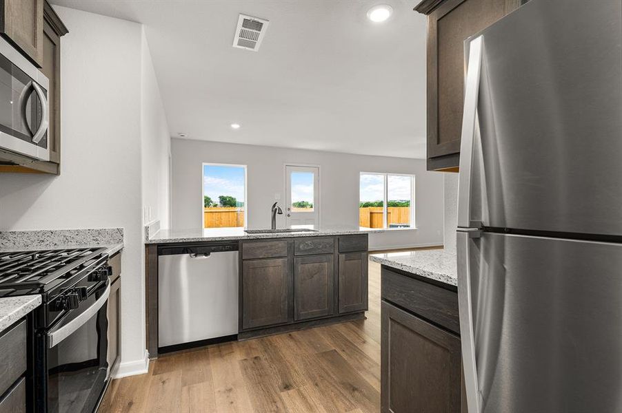 Furnished interior view inside a new home in Patriot Estates, Venus (Image 6).
