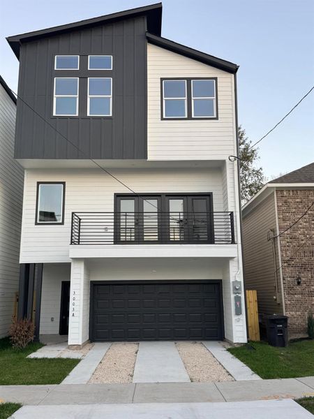 Front exterior of a new home in , Houston, TX, highlighting curb appeal (Image 24).