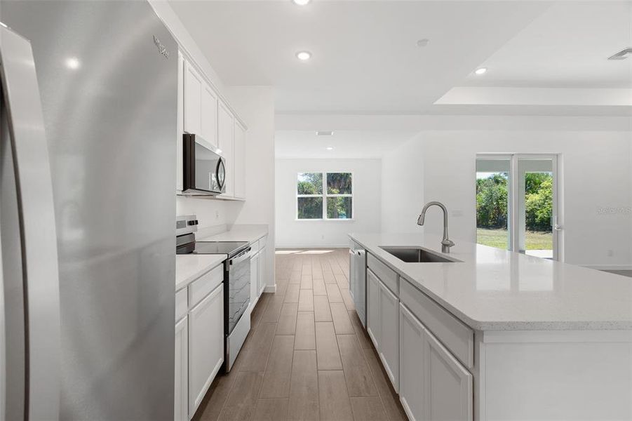 Furnished interior view inside a new home in , North Port (Image 9).