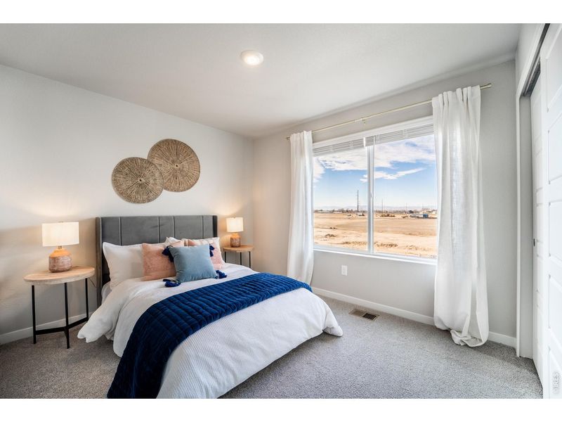 Furnished interior view inside a new home in Liberty Draw, Evans (Image 15).