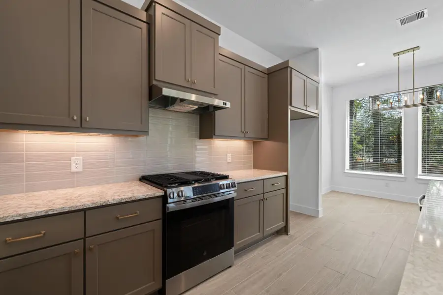 Furnished interior view inside a new home in The Woodlands Hills, Willis (Image 8). Furnished interior view inside a new home in The Woodlands Hills, Willis (Image 8).