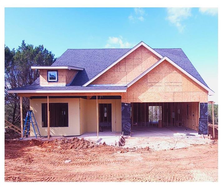 View of front of home with a patio area