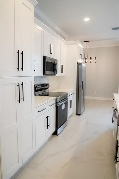 Furnished interior view inside a new home in , Brooksville (Image 8).